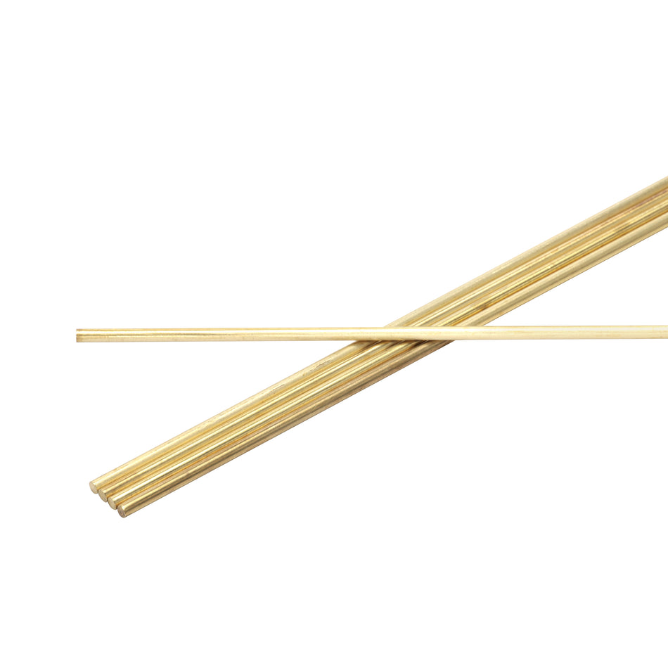 Five brass metal rods on a white background