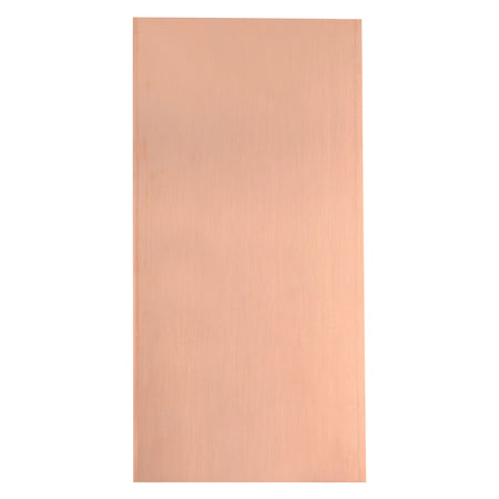 Rectangular piece of copper metal on a white background