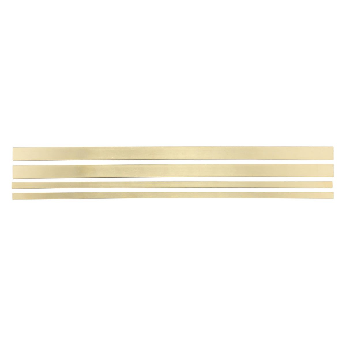 Brass strip assortment of various sizes on a white background